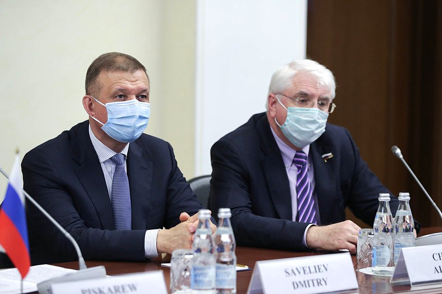 First Deputy Chairman of the Committee on Security and Corruption Control Dmitriy Savelyev and Deputy Chairman of the Committee on International Affairs Aleksei Chepa
