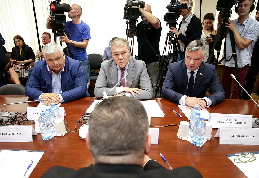 Chairman of the Committee on Issues of the Commonwealth of Independent States and Contacts with Fellow Countryman Leonid Kalashnikov and members of the Committee on Committee on Issues of the Commonwealth of Independent States and Contacts with Fellow Countryman Artem Kavinov and Kazbek Taisaev