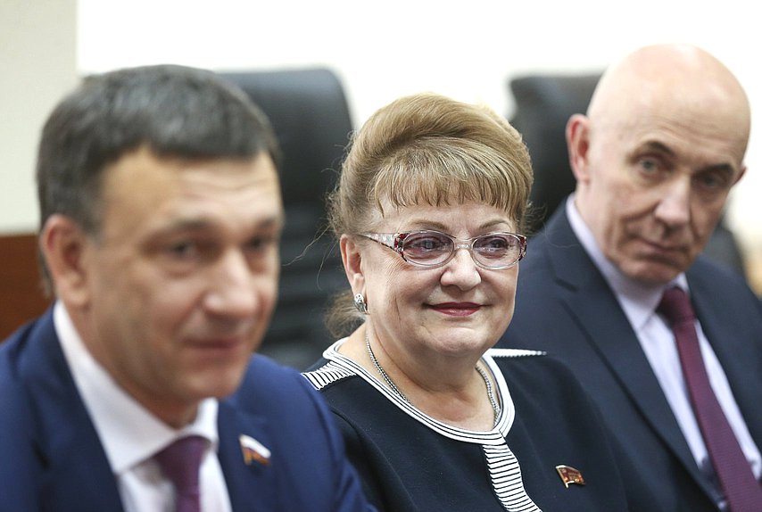 Deputy Chairman of the Committee on Transport and Construction Vladimir Afonskii, member of the Committee on Transport and Construction Olga Alimova and First Deputy Chairman of the Committee on State Building and Legislation Iurii Sinelshchikov