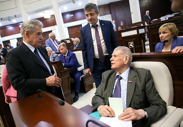 Member of the Committee on Budget and Taxes Nikolai Gonchar and Member of the Committee on Budget and Taxes Gennadii Kulik