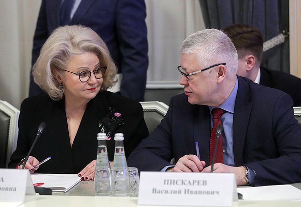 Chairwoman of the Committee on Family Protection, Issues of Fatherhood, Motherhood and Childhood Nina Ostanina and Chairman of the Committee on Security and Corruption Control Vasily Piskarev